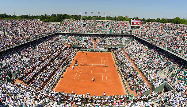 The clay courts at Roland Garros require quite a bit of maintenance throughout the French Open. (Bob Martin/SI)